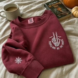 Embroidered Comfort Color® Halloween Sweatshirt – People Give Me The Creeps Skeleton Hand Pullover